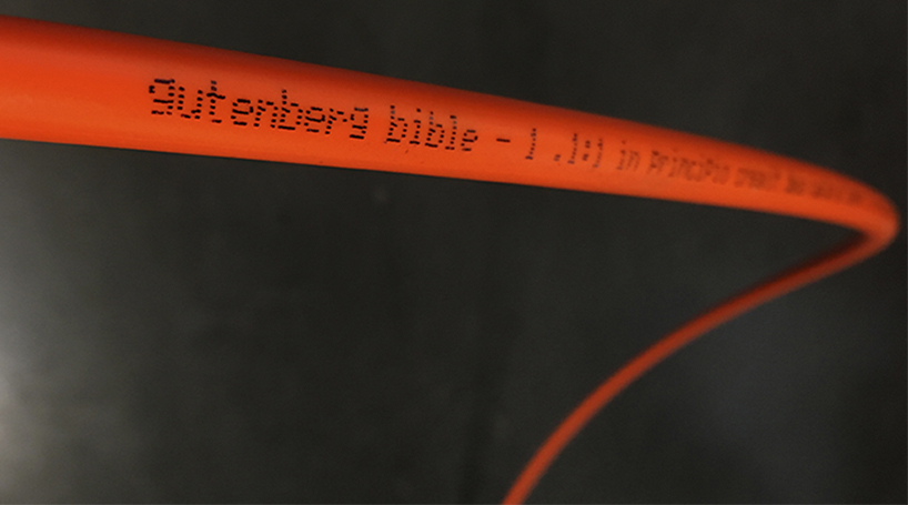 jeroen van loon prints the entire gutenberg bible onto fiber optic cable designboom