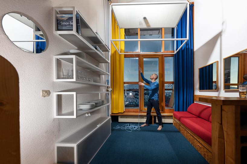 coudamy refurbishes a 19 sqm les arcs apartment with a space saving 'flying table' designboom