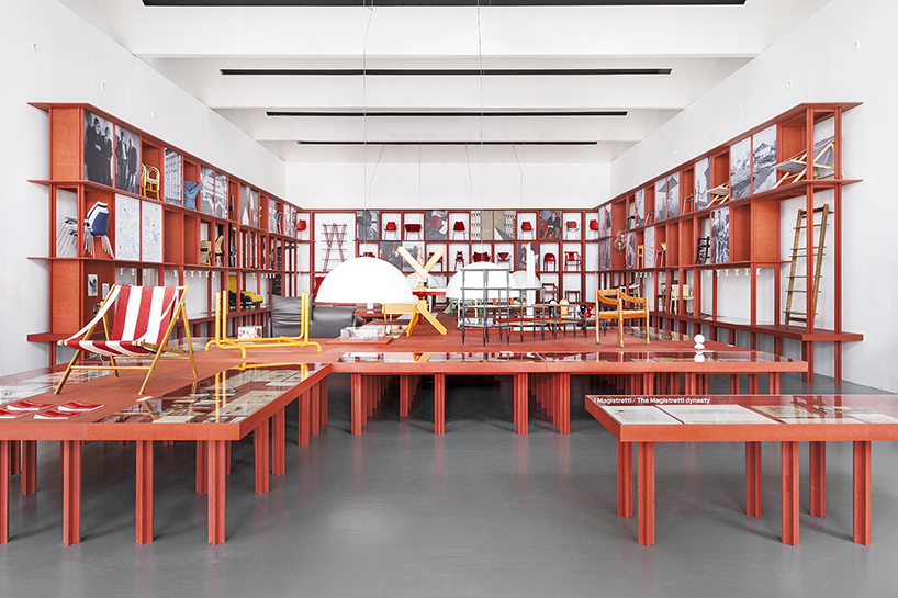 bright red installation by binocle displays vico magistretti's works at the trienalle di milano