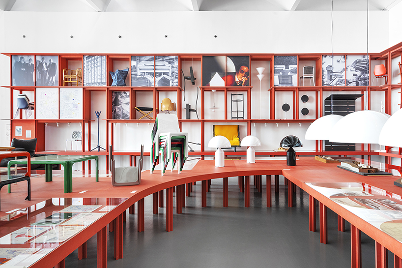 bright red installation by binocle displays vico magistretti's works at the trienalle di milano