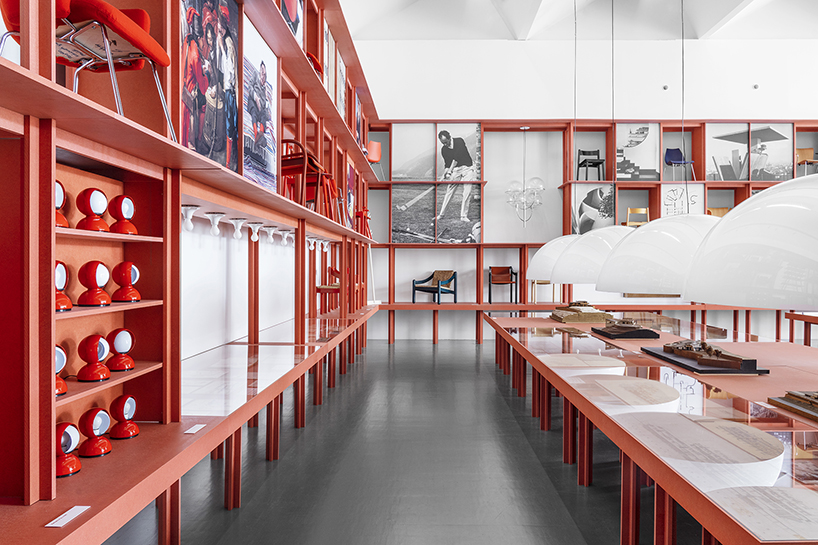 bright red installation by binocle displays vico magistretti's works at the trienalle di milano