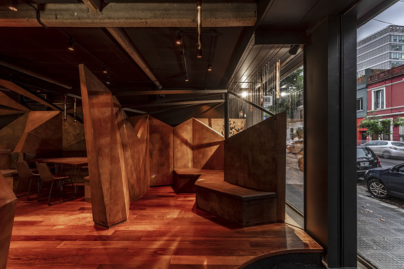 estudio HMA's mamba bar fuses oxidised iron tones with greenery in buenos aires