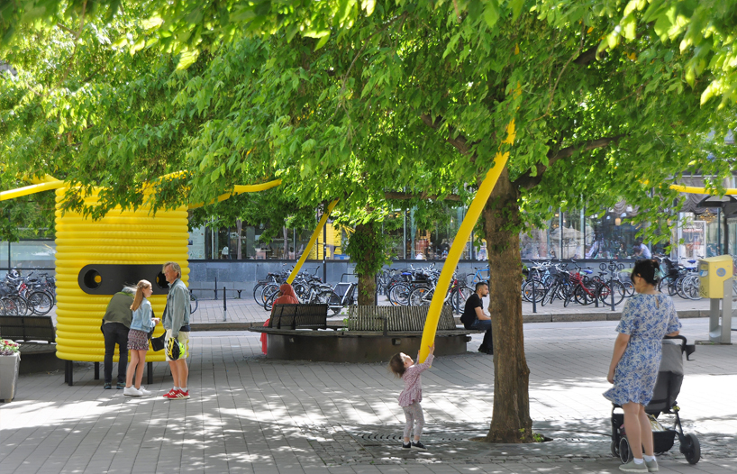 moradavaga’s giant yellow characters are acoustically interconnected in square in sweden