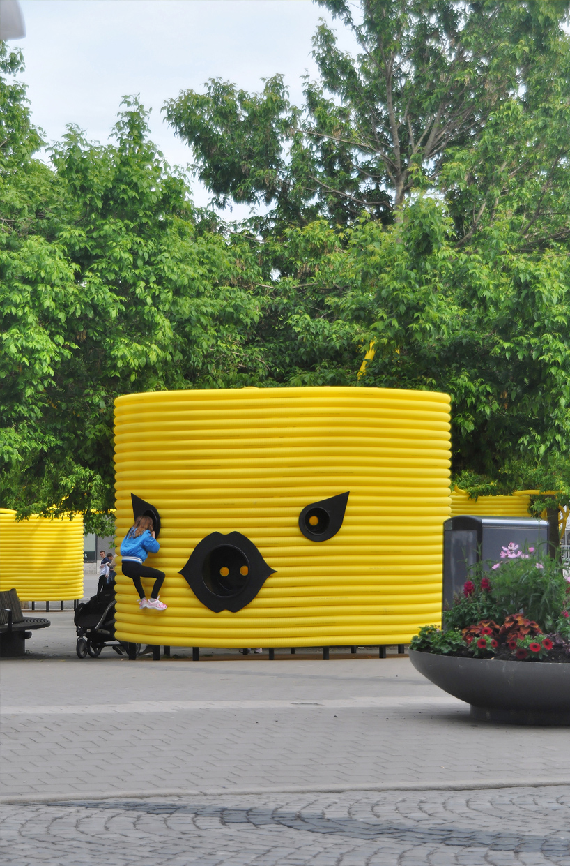moradavaga’s giant yellow characters are acoustically interconnected in square in sweden