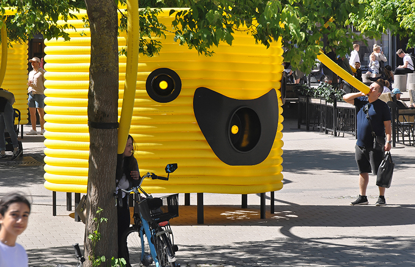 moradavaga’s giant yellow characters are acoustically interconnected in square in sweden