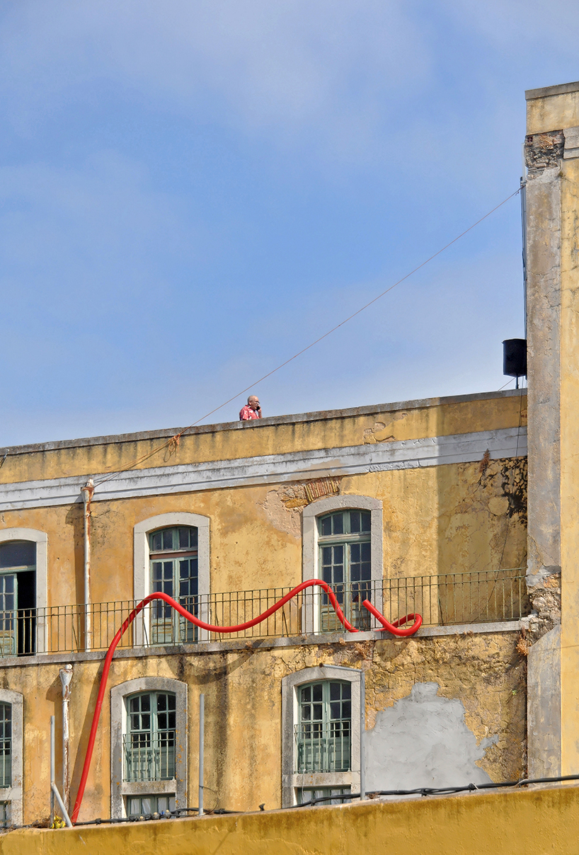 interactive giant squids tentacles embrace old beer factory on the margins of ria formosa 12