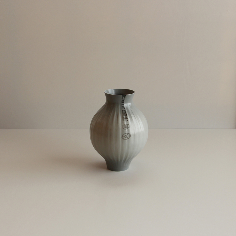 plastic pipes used to distribute water transformed into hand blown vases