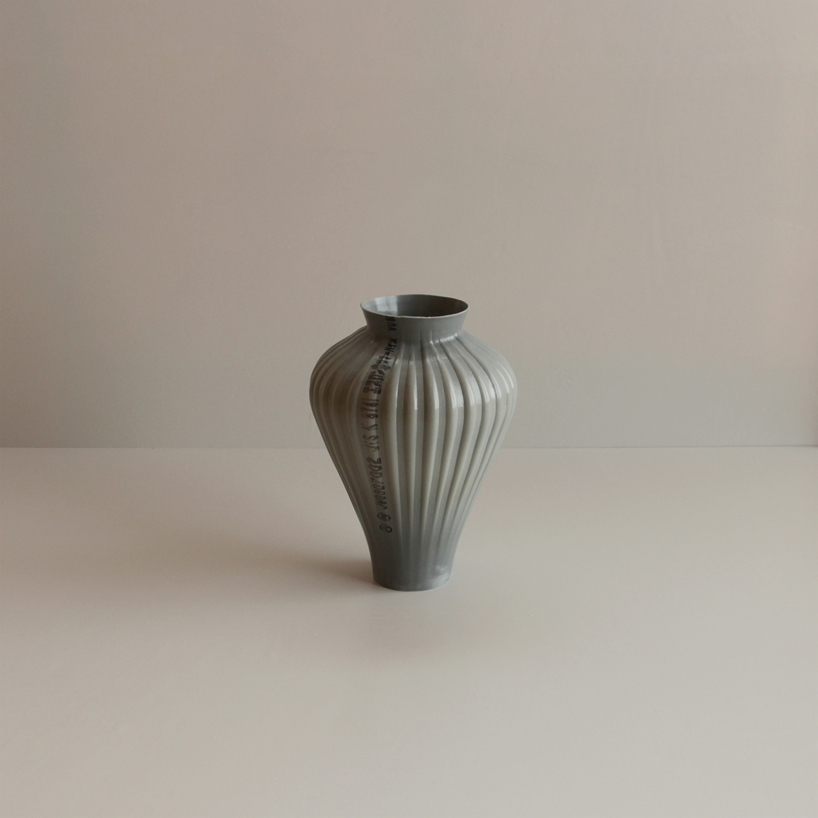 plastic pipes used to distribute water transformed into hand blown vases