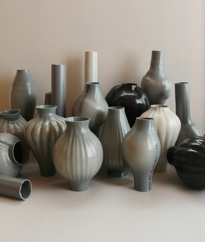 plastic pipes used to distribute water transformed into hand blown vases