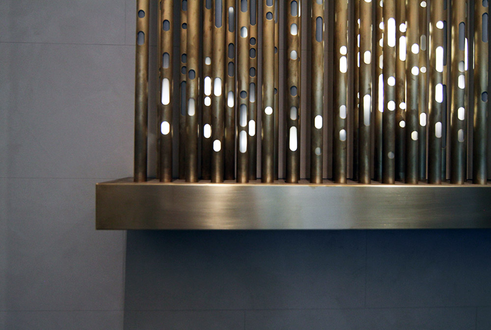 SOFTlab creates light organ by layering an array of LED-filled brass pipes stratus