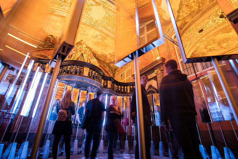 SOFTlab creates circular light installation of movement responsive mirrors and LEDs