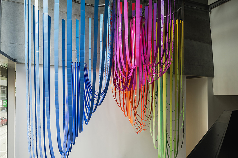 SOFTlab's billowing paper strip installation softens concrete cincinatti museum by zaha hadid