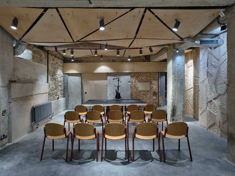maxim calujac wraps corten steel and an external staircase around an art center in moldova designboom