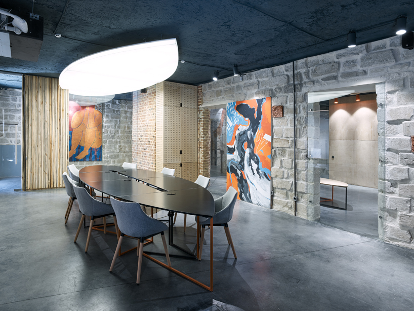 maxim calujac wraps corten steel and an external staircase around an art center in moldova designboom