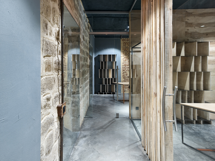 maxim calujac wraps corten steel and an external staircase around an art center in moldova designboom