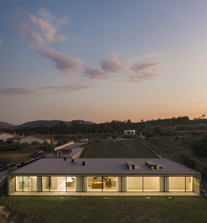 contaminar designs an l shape concrete house surrounded by olive trees in porto de mos 12