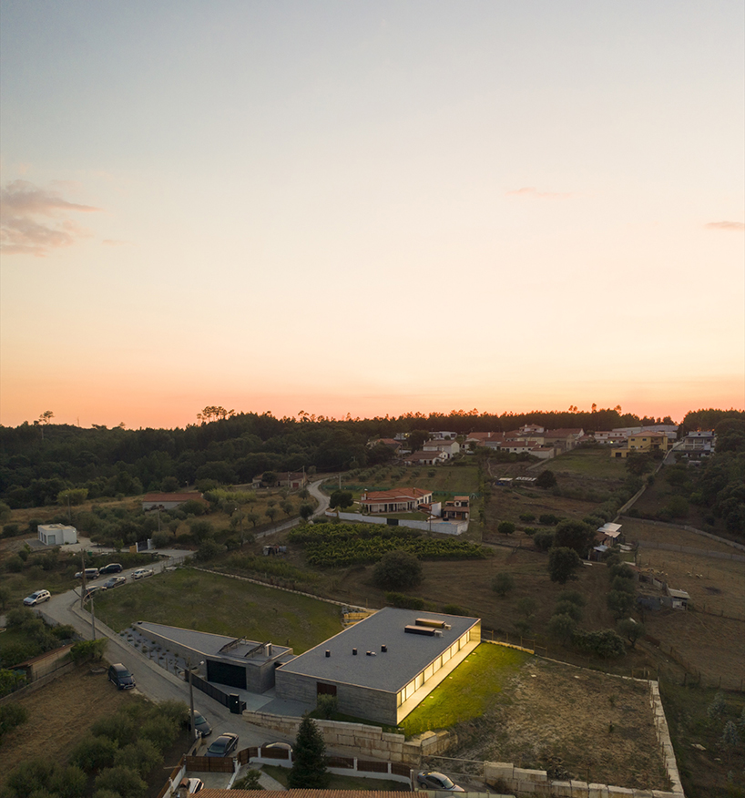 contaminar designs an l shape concrete house surrounded by olive trees in porto de mos 9