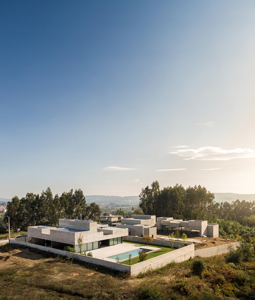 spaceworkers designs a 'house for books' with a monolithic roof in rural portugal designboom