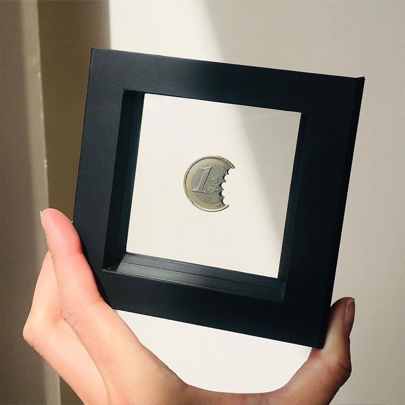 lucie davis takes a bite out of euro coins in recent NFT collection