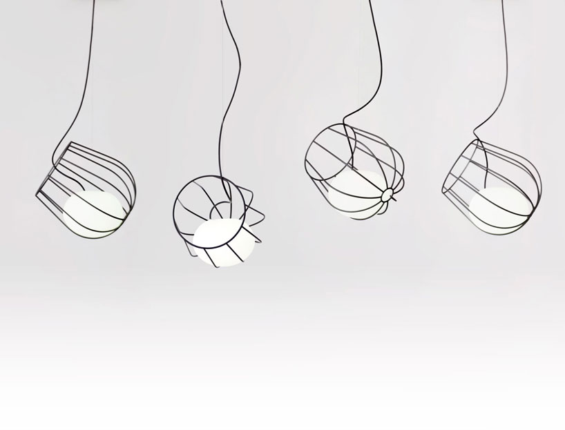 martín azúa suspends dipping metallic basket in light container - 2