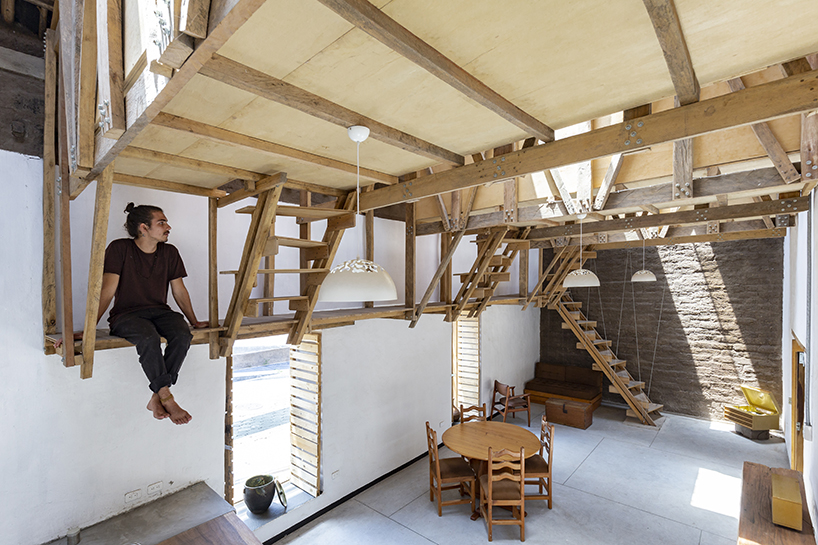 al borde refurbishes an 18th century ruin in ecuador into family house with suspended beds designboom