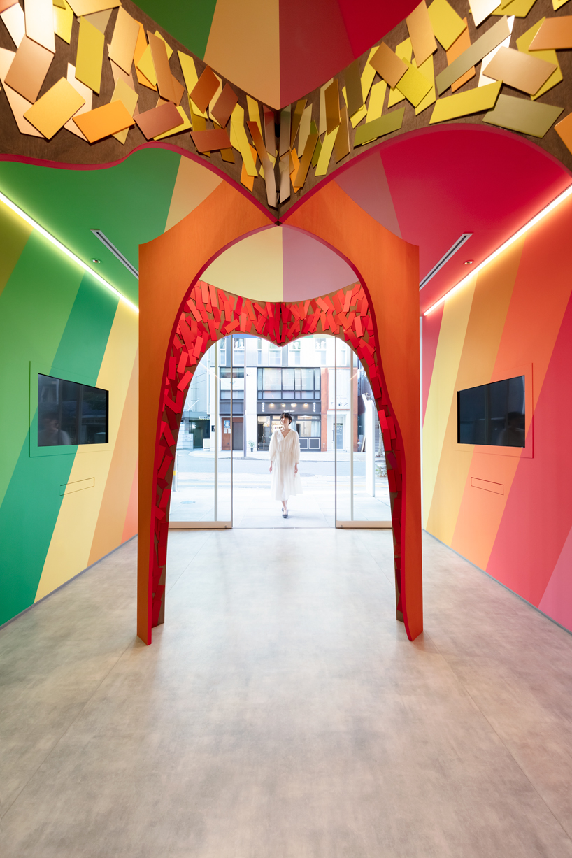 moriyuki ochiai architects crafts chromatic maze from discarded paint samples for showroom in tokyo