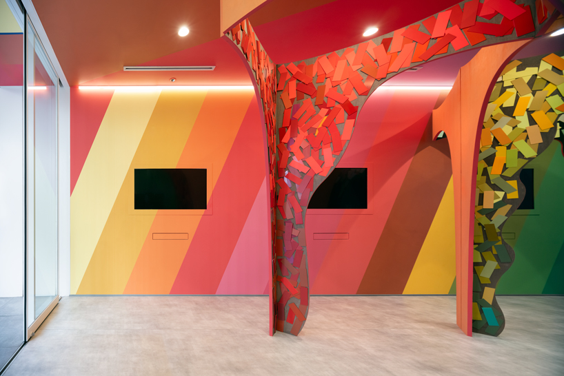 moriyuki ochiai architects crafts chromatic maze from discarded paint samples for showroom in tokyo