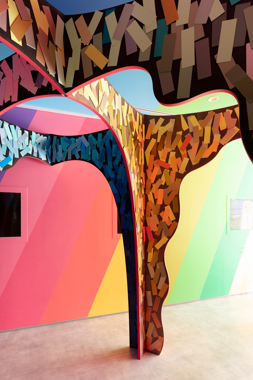 moriyuki ochiai architects crafts chromatic maze from discarded paint samples for showroom in tokyo