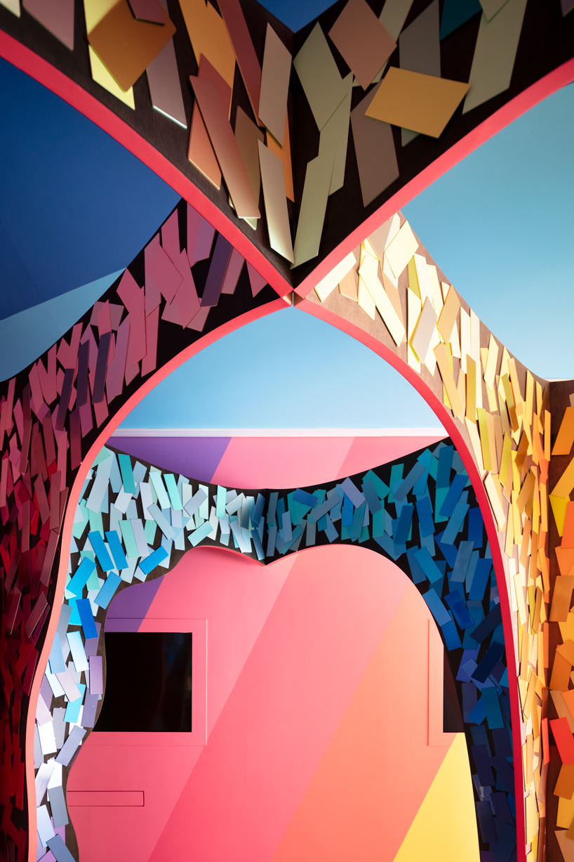 moriyuki ochiai architects crafts chromatic maze from discarded paint samples for showroom in tokyo