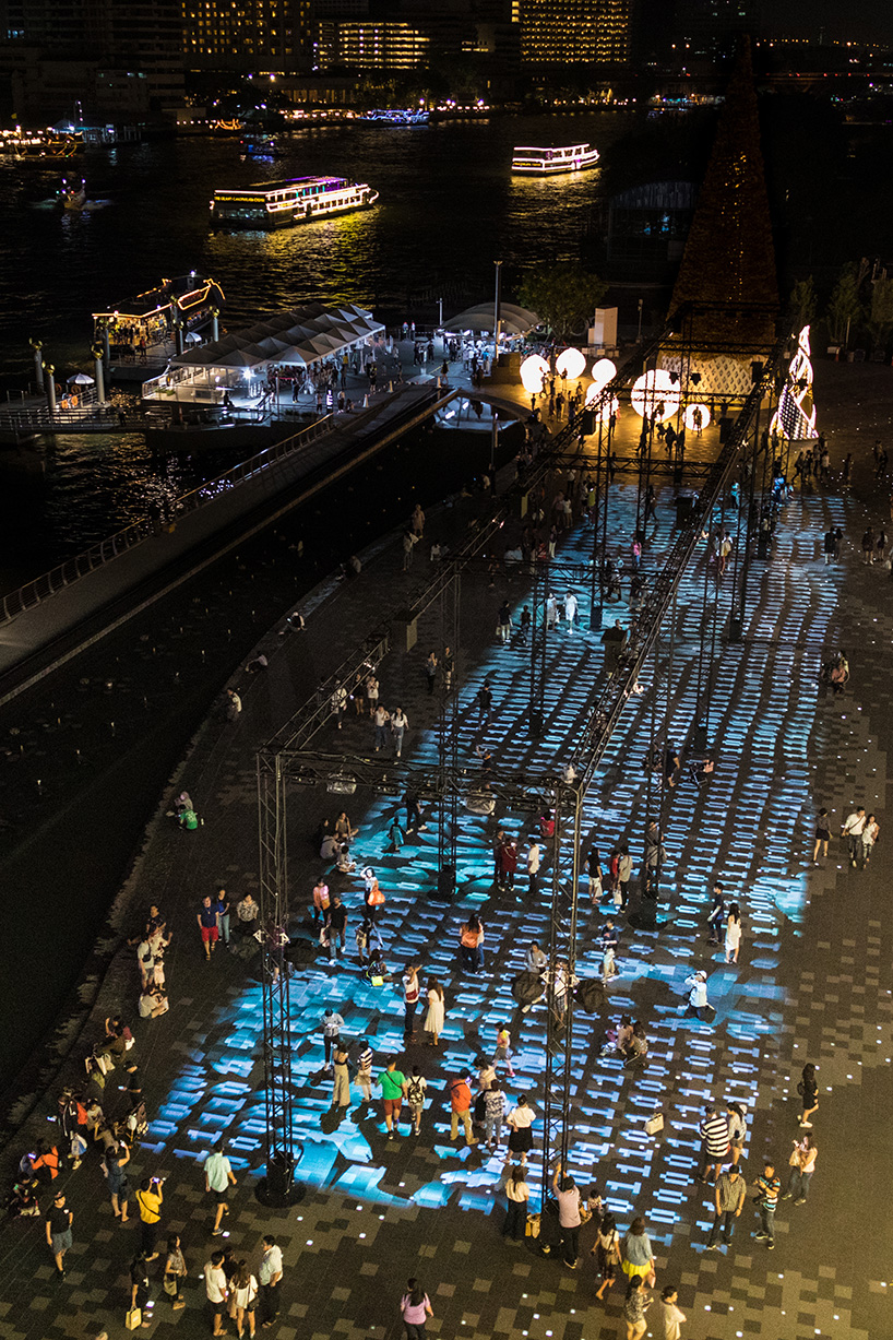 miguel chevalier covers a square in bangkok with a giant carpet of light designboom