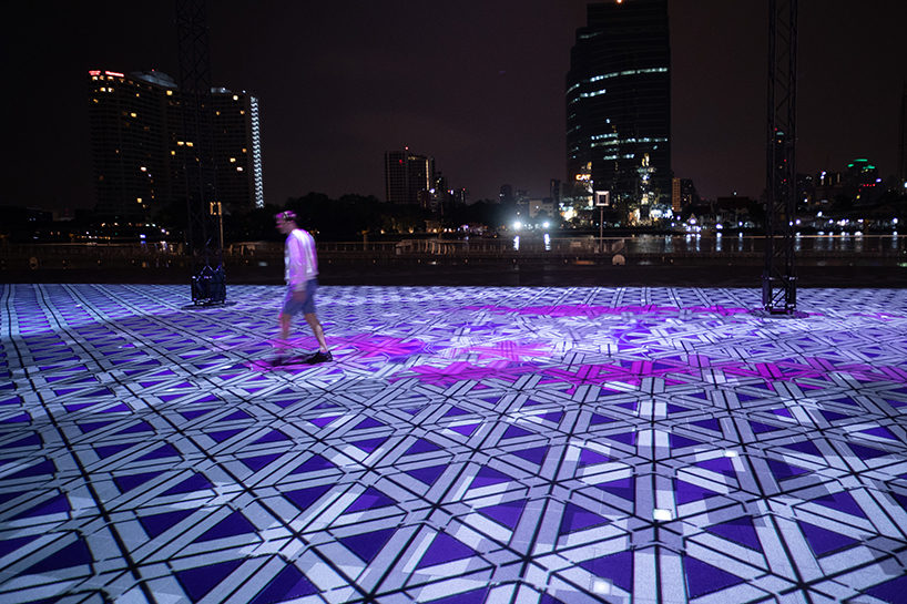 miguel chevalier covers a square in bangkok with a giant carpet of light designboom