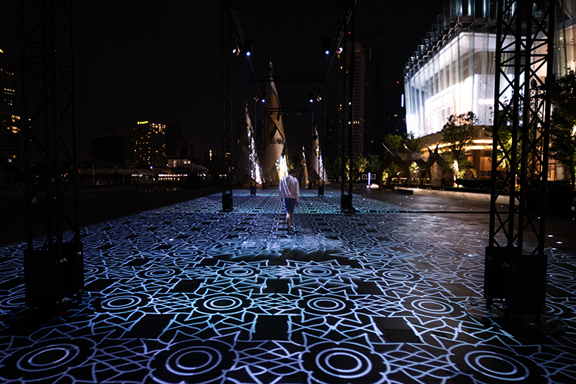 miguel chevalier covers a square in bangkok with a giant carpet of light designboom