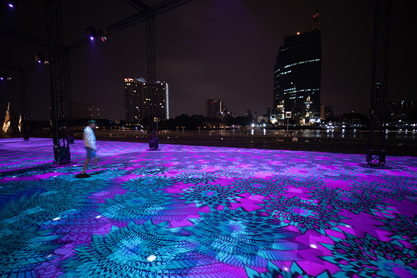 miguel chevalier covers a square in bangkok with a giant carpet of light designboom