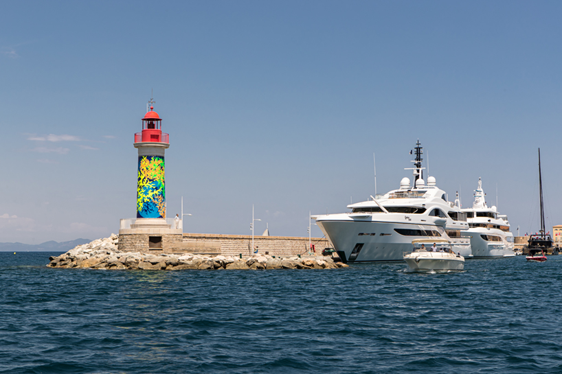 miguel chevalier's fluorescent coral wraps st tropez's lighthouse designboom