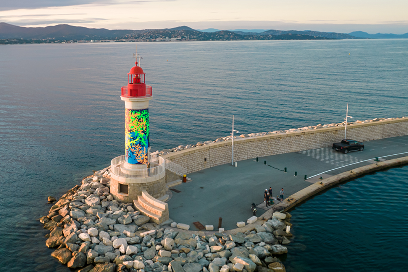 miguel chevalier's fluorescent coral wraps st tropez's lighthouse designboom