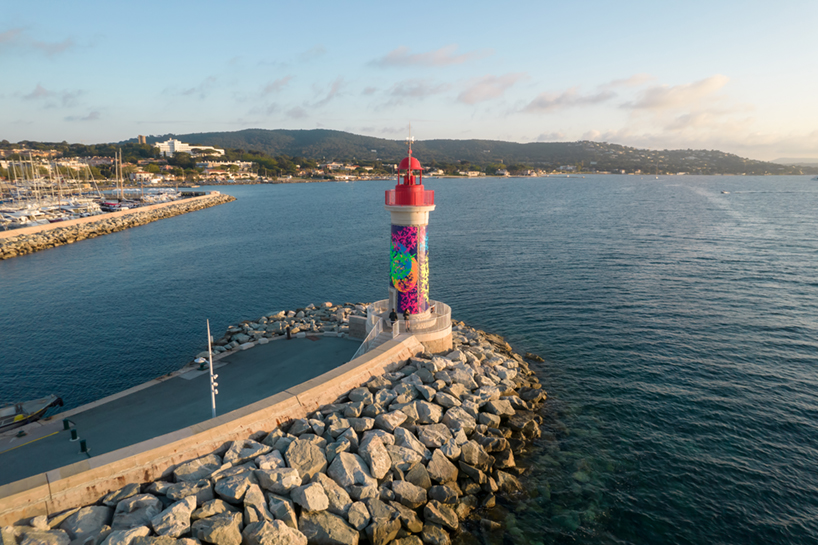 miguel chevalier's fluorescent coral wraps st tropez's lighthouse designboom