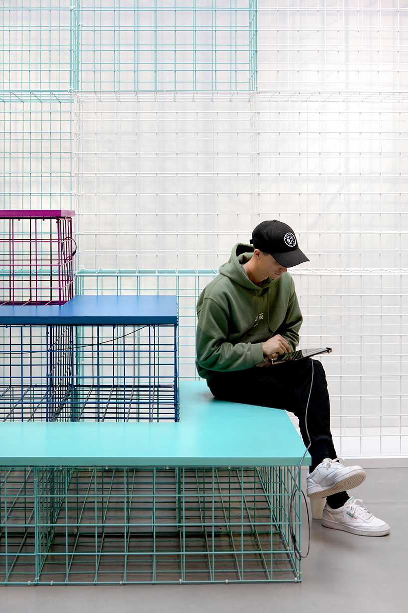 studio 5•5 creates a colorful grid-like scenography for exhibition in paris designboom