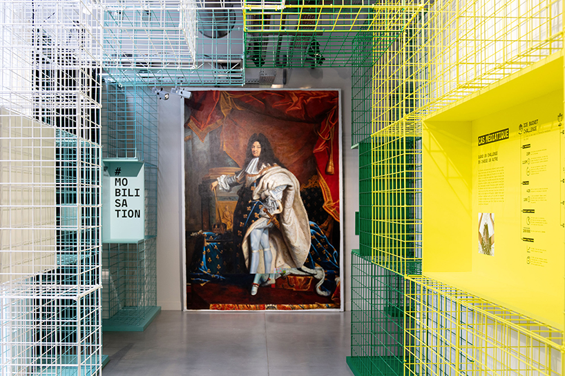 studio 5•5 creates a colorful grid-like scenography for exhibition in paris designboom