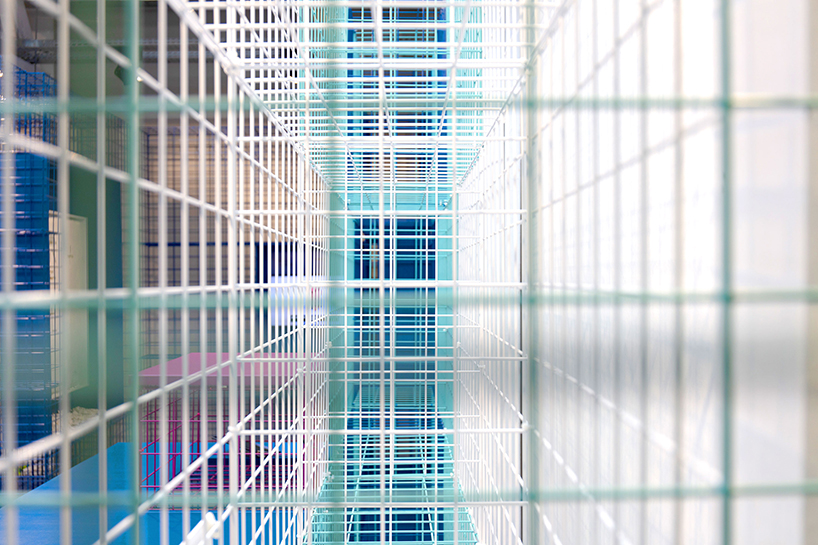 studio 5•5 creates a colorful grid-like scenography for exhibition in paris designboom