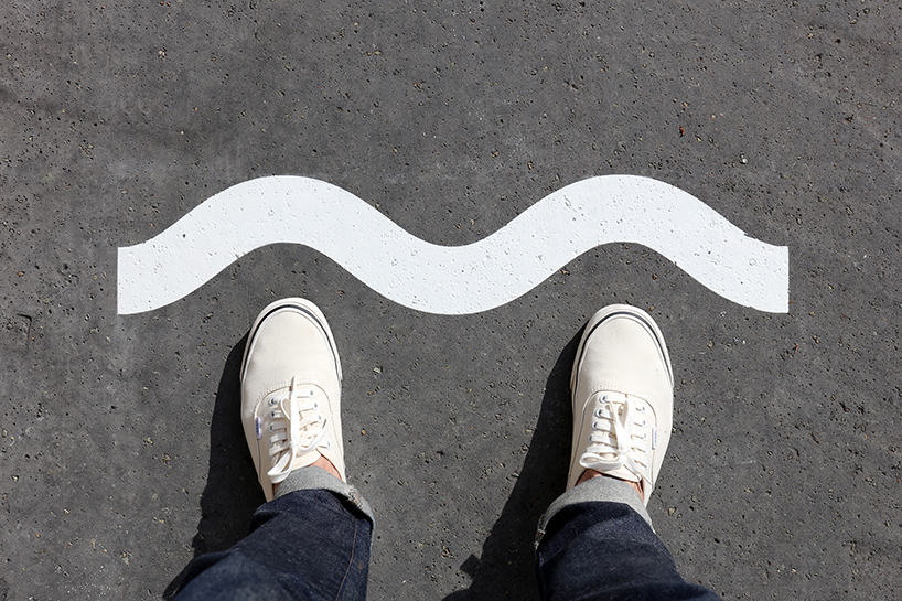 wave-themed street signage system by studio 5•5 encourages parisians to social distance