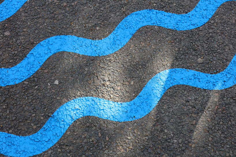 wave-themed street signage system by studio 5•5 encourages parisians to social distance