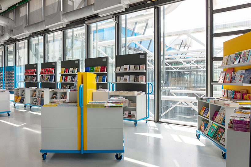 studio 5•5 redesigns bookshop with transportable trolley furniture at centre pompidou