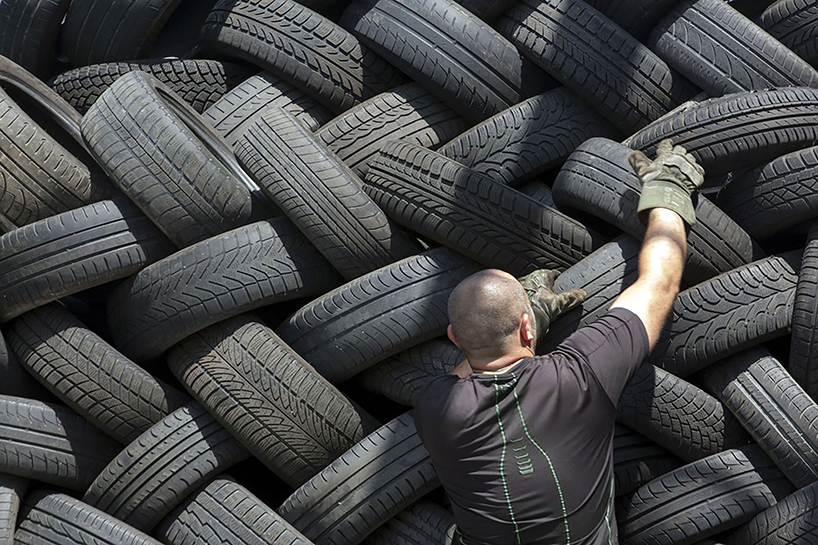 studio 5•5’s eco-friendly car showroom sets flexible furniture on recycled tire bricks