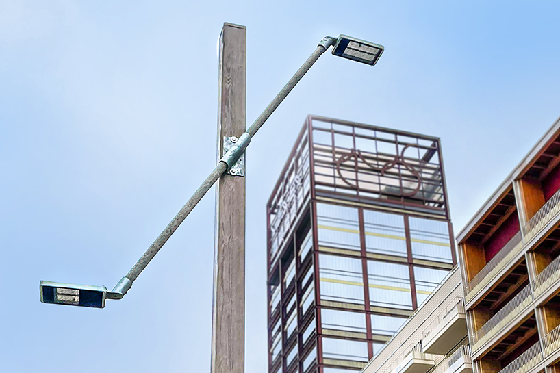 studio 5•5 repurposes old scaffolding pipes and street lamps to illuminate paris olympic village