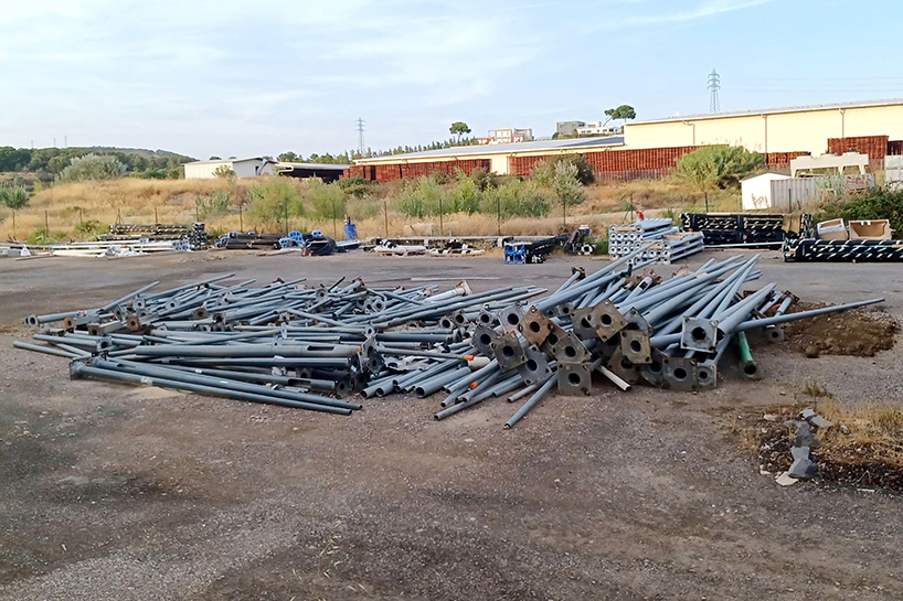 studio 5•5 repurposes old scaffolding pipes and street lamps to illuminate paris olympic village