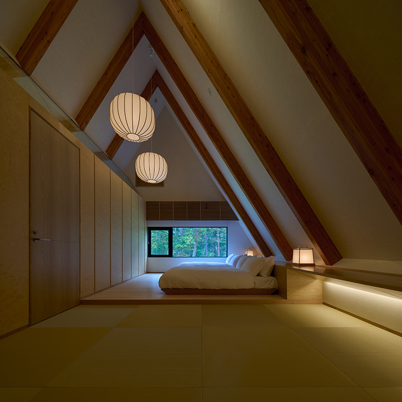 triangular volumes of GENETO's resort in japan echoes the mountain peaks beyond