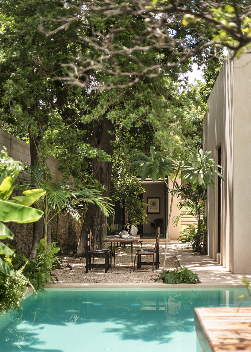 workshop architects preserves 20th-century stone masonry for contemporary mexican home