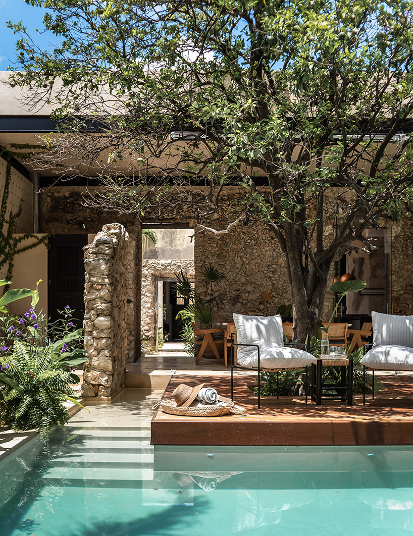 workshop architects preserves 20th-century stone masonry for contemporary mexican home
