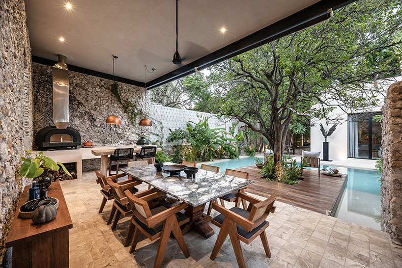 workshop architects preserves 20th-century stone masonry for contemporary mexican home