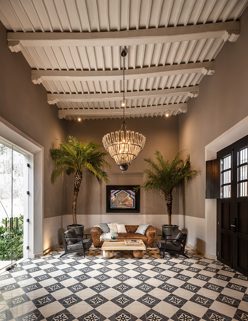 workshop architects preserves 20th-century stone masonry for contemporary mexican home